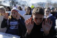 <p>Bethesda Chevy Chase students Alia Berry-Drobnick and Sam Blank gather with other students outside the White House in Washington, U.S., as they join thousands of students across the country planning to walk out of classes in calling for stricter gun laws March 14, 2018. (Photo: Jim Bourg/Reuters) </p>