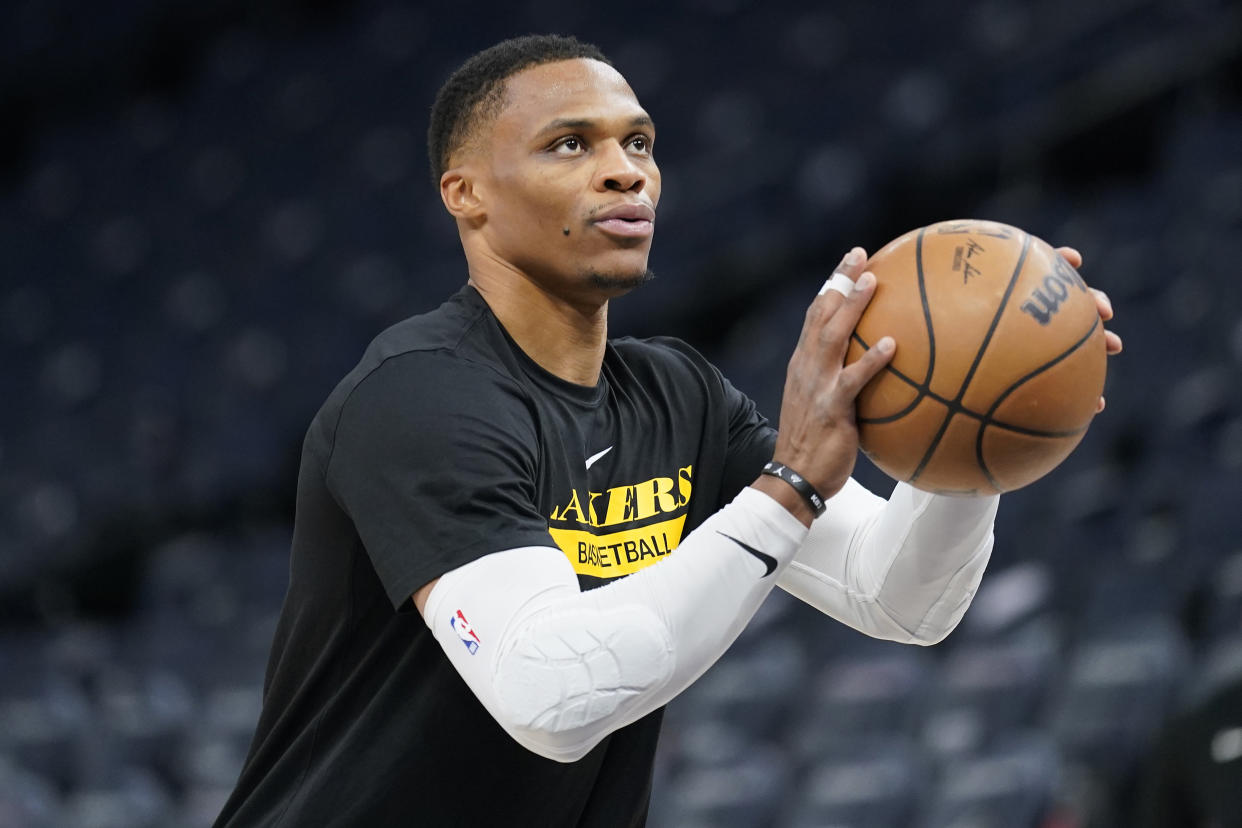 Los Angeles Lakers guard Russell Westbrook warms up before an NBA basketball game against the Minnesota Timberwolves, Friday, Oct. 28, 2022, in Minneapolis. (AP Photo/Abbie Parr)
