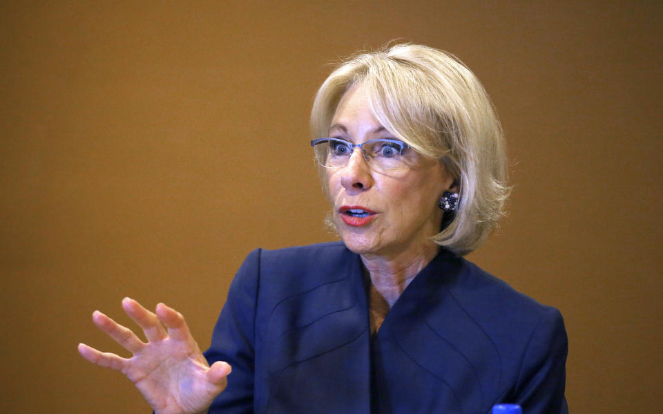 U.S. Education Secretary Betsy DeVos speaks at a roundtable discussion on school choice with Arizona community leaders, educators, parents and students Thursday, Dec. 5, 2019, in Scottsdale, Ariz. DeVos talked about her $5 billion plan to fund tuition for private and charter school students, prior to addressing the American Legislative Exchange Council. (AP Photo/Ross D. Franklin)