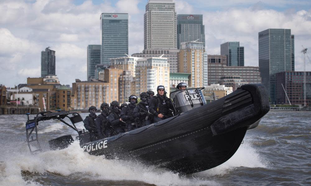 Armed Metropolitan police counter terrorism officers during an exercise on the Thames.