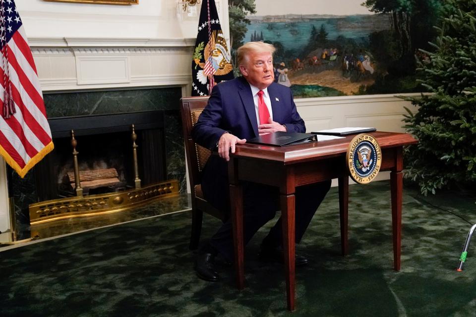 U.S. President Donald Trump arrives to a Thanksgiving video teleconference with members of the military forces at the White House in Washington, U.S., November 26, 2020