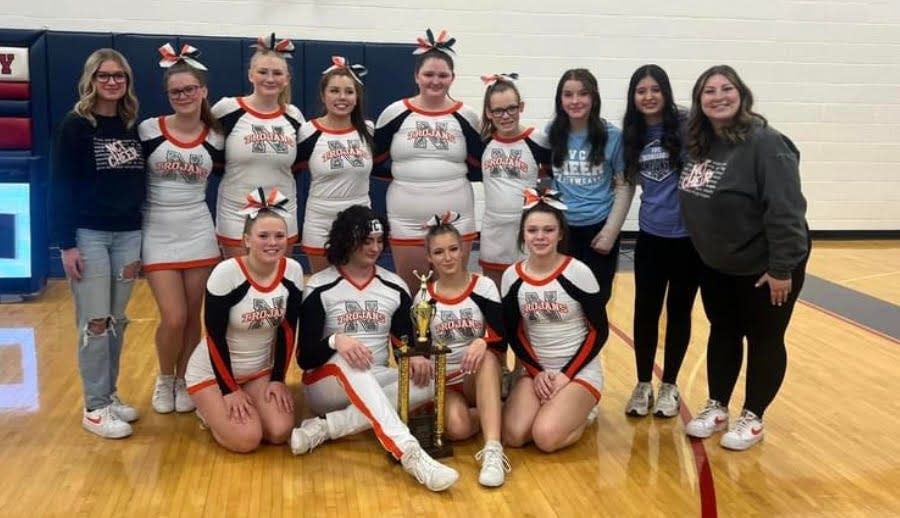 Members of the Newcomerstown High School cheerleading squad and their coaches include, front row, Heaven Amore, Nash Bricker, Kelly Hinds, Madison Kellish, back row, coach Lexy Johnson, Maggie Smith, Emma Perry, Emily Dees, Madi Moore, Navaeh Phillips, Makayla McConnell, Amanda Ryan, and coach Haylee Elliott.