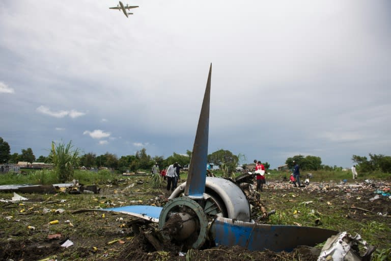 Dozens of passengers were illegally on board the An-12 cargo plane, which crashed into a farming community on an island in the White Nile river seconds after departure