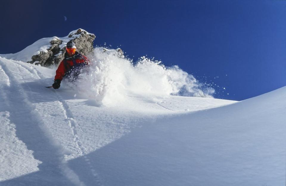 Skier in powdery snow