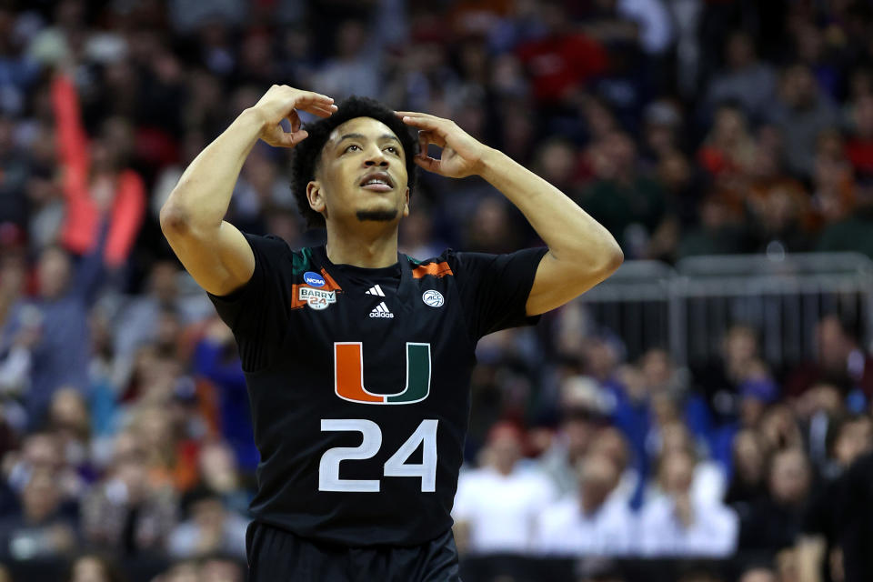 KANSAS CITY, MISSOURI - MARCH 24: Nijel Pack #24 of the Miami Hurricanes celebrates after a three-point basket against the Houston Cougars during the second half in the Sweet 16 round of the NCAA Men's Basketball Tournament at T-Mobile Center on March 24, 2023 in Kansas City, Missouri. (Photo by Jamie Squire/Getty Images)