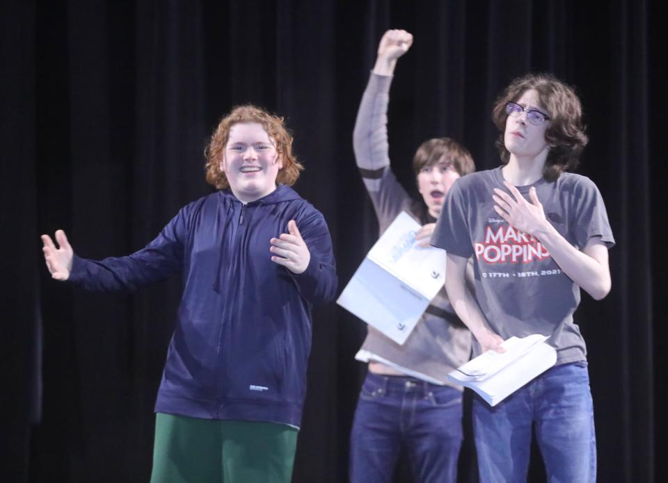 From left, Grayson Griffith, Casey Renner and Winter Marchant rehearse for the Akron All-City Musical production of "The Little Mermaid" at the Goodyear Theater in Akron Monday.