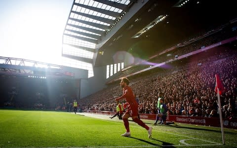 A general view ofd match action at Anfield, the home stadium of Liverpool as Mohamed Salah of Liverpool takes a corner during the Premier League match between Liverpool FC and Cardiff - Credit: GETTY IMAGES
