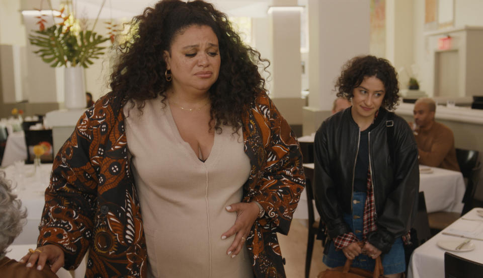 This image released by Neon shows Michelle Buteau, left, and Ilana Glazer in a scene from the film "Babes." (Neon via AP)