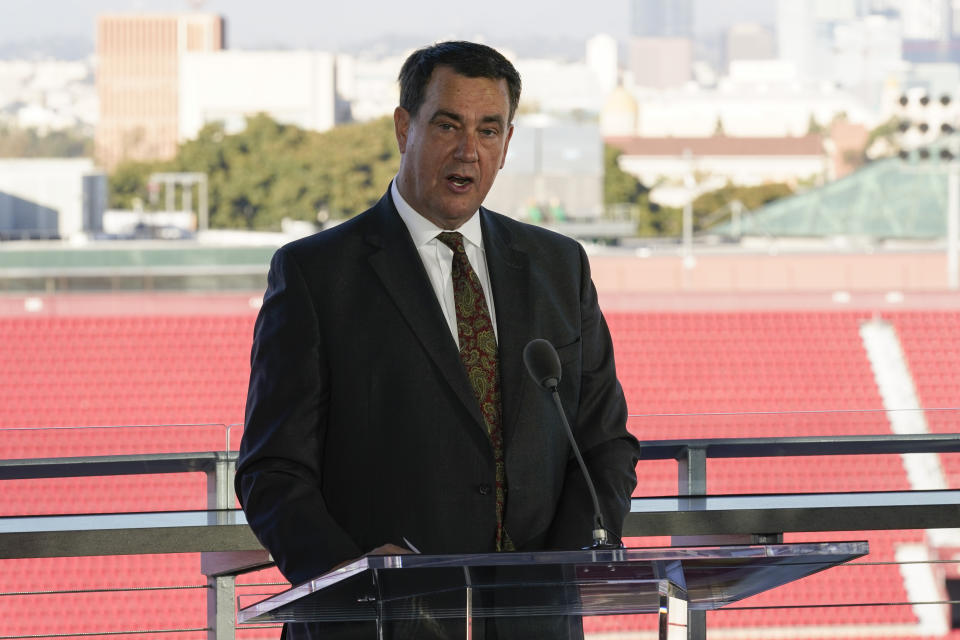 Athletic Director Mike Bohn introduces the new head football coach, Lincoln Riley, in Los Angeles, Monday, Nov. 29, 2021. (AP Photo/Ashley Landis)