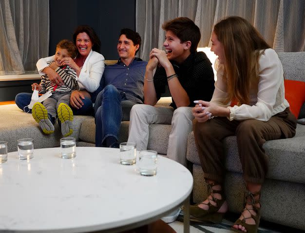 <p>SEAN KILPATRICK/POOL/AFP via Getty </p> Sophie Grégoire, Justin Trudeau and their children Hadrien, Xavier and Ella-Grace.