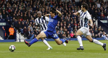 Britain Football Soccer - West Bromwich Albion v Leicester City - Premier League - The Hawthorns - 29/4/17 Leicester City's Shinji Okazaki in action with West Bromwich Albion's Allan Nyom and Claudio Yacob Reuters / Darren Staples Livepic