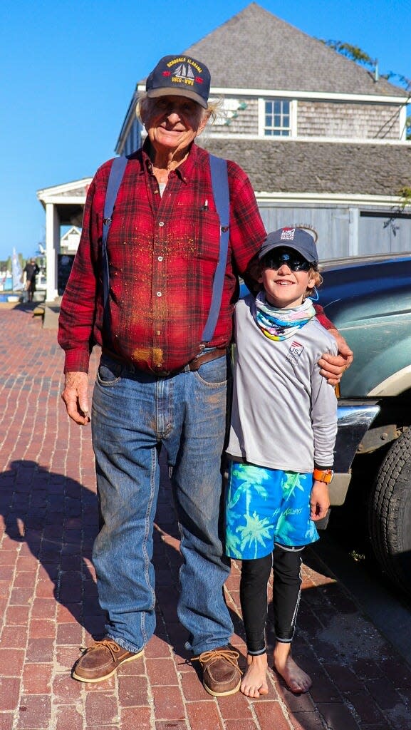 Briggs Kossmann, of Duxbury, then 10, met Robert Douglas, the 91-year-old owner of The Black Dog tavern, when Briggs sailed solo from Falmouth to Martha's Vineyard in September.