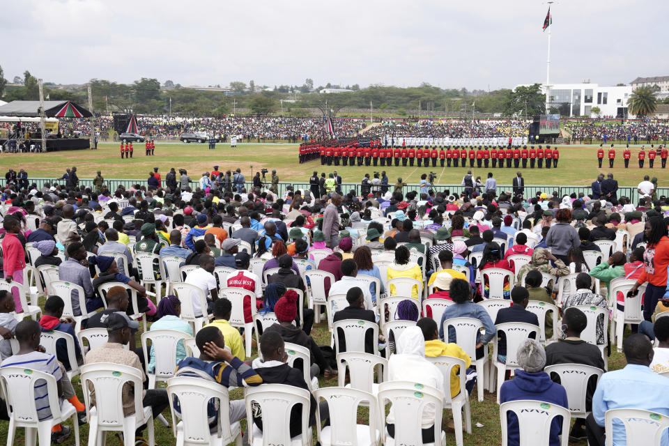 Kenyans attend the 60th Jamhuri Day Celebrations (Independence Day) at Uhuru gardens Stadium in Nairobi, Monday, Dec. 12, 2023. Thousands of Kenyans braved a chilly morning to attend festivities Tuesday in the capital Nairobi, to mark 60 years since the East African country gained independence from British Colonial rule. (AP Photo/Brian Inganga)