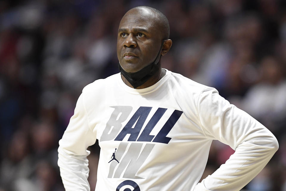 Georgetown head coach James Howard watches play in the second half of an NCAA college basketball game against Connecticut in the Big East tournament quarterfinals at Mohegan Sun Arena, Saturday, March 5, 2022, in Uncasville, Conn. (AP Photo/Jessica Hill)