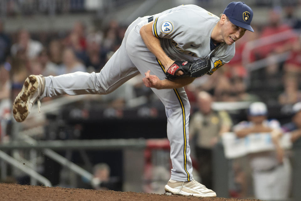 Milwaukee Brewers Brent Suter follows through on a delivery to an Atlanta Braves batter during the ninth inning of a baseball game Friday, July 30, 2021, in Atlanta. (AP Photo/Hakim Wright Sr.)