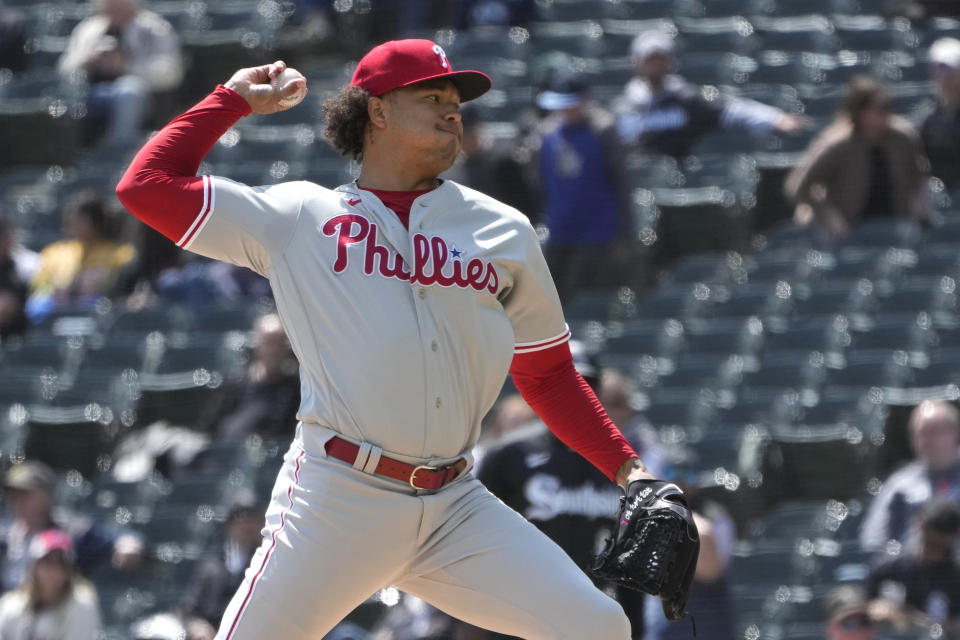 Philadelphia Phillies starting pitcher Taijuan Walker delivers during the first inning of a baseball game against the Chicago White Sox Wednesday, April 19, 2023, in Chicago. (AP Photo/Charles Rex Arbogast)