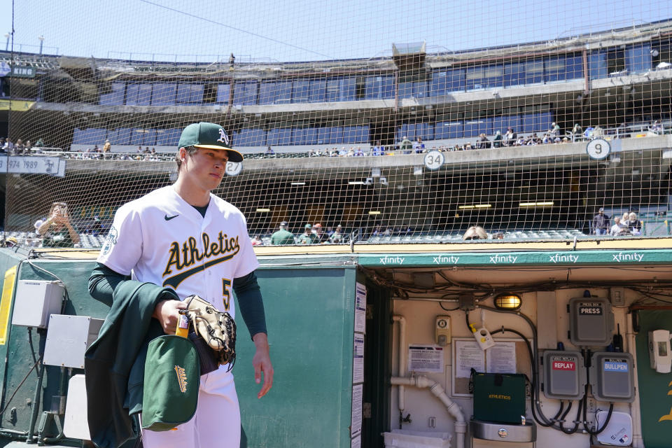 Oakland Athletics pitcher Mason Miller takes the field to warm up before a baseball game against the Chicago Cubs, Wednesday, April 19, 2023, in Oakland, Calif. (AP Photo/Godofredo A. Vásquez)