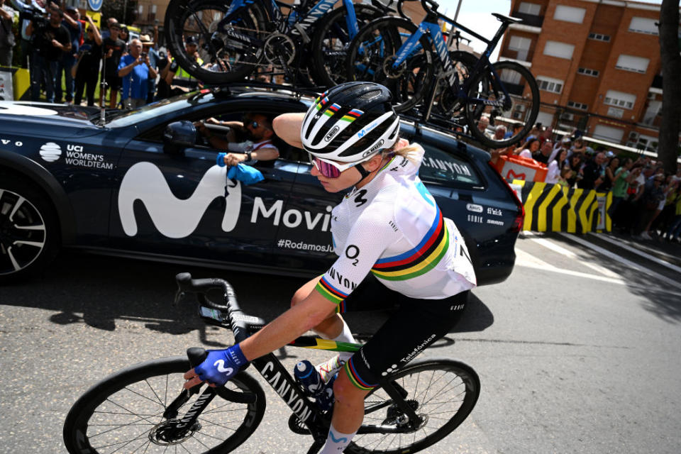 LA RODA SPAIN  MAY 03 Annemiek Van Vleuten of The Netherlands and Movistar Team picks bottles and food from the team car during the 9th La Vuelta Femenina 2023 Stage 3 a 1578km stage from Elche de la Sierra to La Roda  UCIWWT  on May 03 2023 in La Roda Spain Photo by Dario BelingheriGetty Images