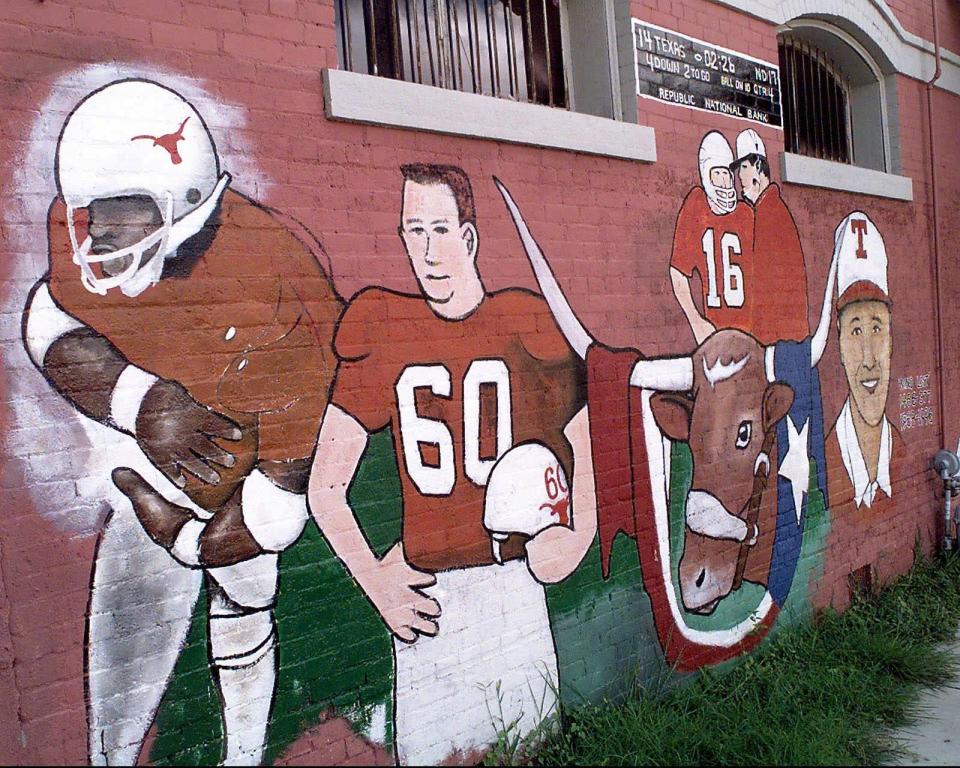 An unfinished mural in the summer of 1997 on the 1200 block of E. 6th St. honored Texas sports legends Earl Campbell, Tommy Nobis, James Street, Darrell Royal and Cliff Gustafson, who won two national championships with the Longhorns and 22 Southwest Conference titles.