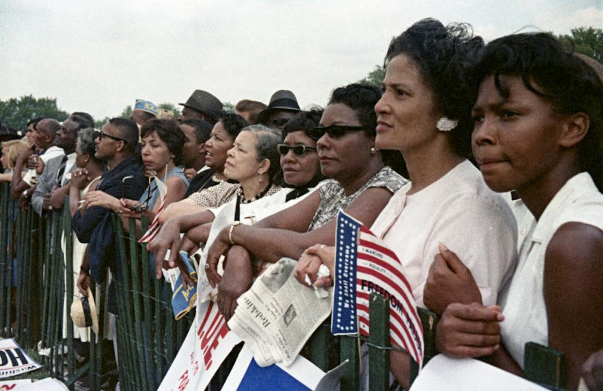 Women listen during the March on Washington on Aug. 28, 1963. <a href="https://www.gettyimages.com/detail/news-photo/view-of-participants-in-the-march-on-washington-some-with-news-photo/1350105902?phrase=%22march%20on%20washington%22&adppopup=true" rel="nofollow noopener" target="_blank" data-ylk="slk:Bettmann Archive/Getty Images;elm:context_link;itc:0;sec:content-canvas" class="link ">Bettmann Archive/Getty Images</a>