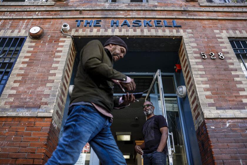 Los Angeles, CA, Friday, February 9, 2024 - Micah Ray, lives in the Haskell Hotel. He is trying to leave after being there for a couple years so he can take primary custody of his son after his mother passed away. Ray says the SRO is better than a tent but otherwise dismal. (Robert Gauthier/Los Angeles Times)