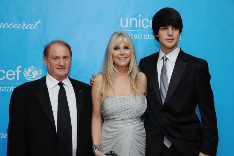 Mike Medavoy (L), seen with his wife Irena and their son Nick, discusses James Bond in "Icons Unearthed." File Photo by Jim Ruymen/UPI