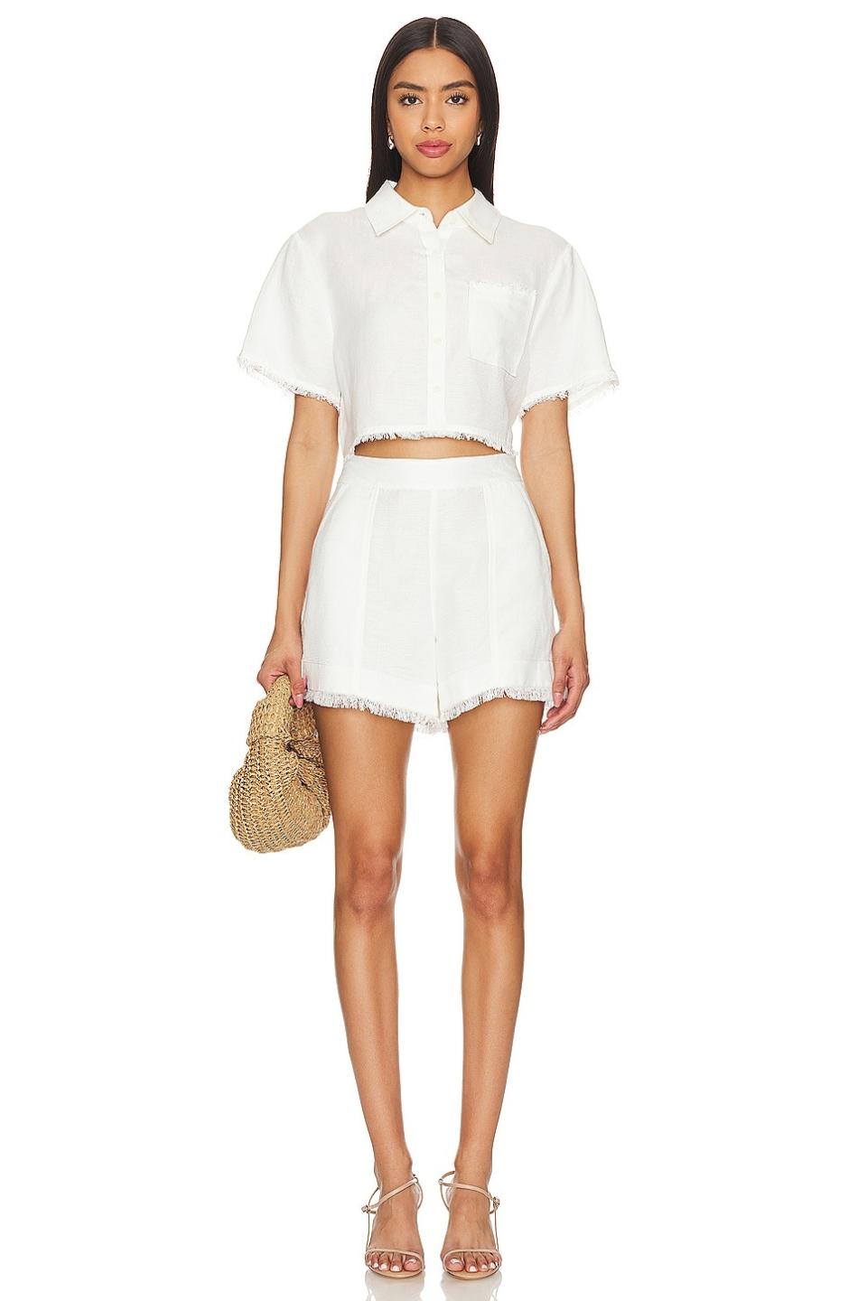 Simkhai Solange cropped shirt and Dax short.