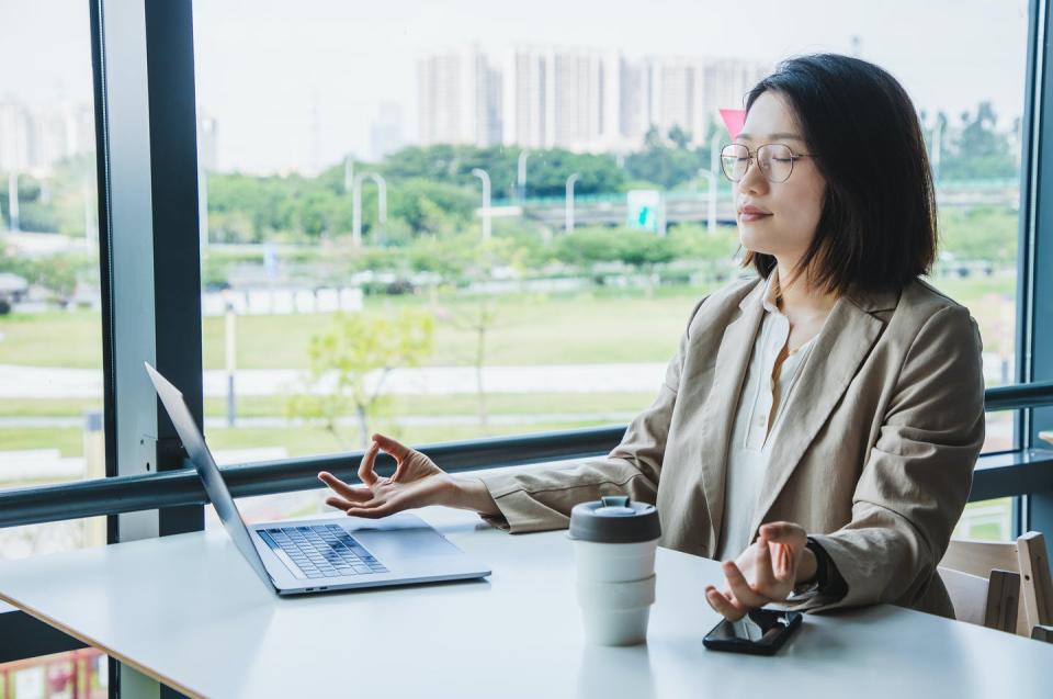 <span class="caption">Have the benefits of medicine been overhyped in the West?</span> <span class="attribution"><a class="link " href="https://www.gettyimages.com/detail/photo/asian-businesswoman-meditating-in-the-office-royalty-free-image/1348829930?adppopup=true" rel="nofollow noopener" target="_blank" data-ylk="slk:Kilito Chan/Moment via Getty Images;elm:context_link;itc:0;sec:content-canvas">Kilito Chan/Moment via Getty Images</a></span>