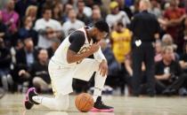 Oct 17, 2017; Cleveland, OH, USA; Cleveland Cavaliers guard Dwyane Wade (9) prays after Boston Celtics forward Gordon Hayward injured his ankle during the first half at Quicken Loans Arena. Mandatory Credit: Ken Blaze-USA TODAY Sports