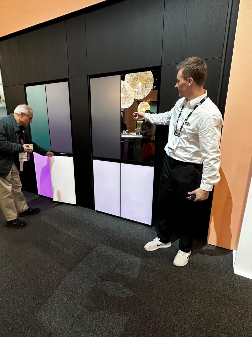 LG Studio’s MoodUP customizable refrigerator features color-changing panels with 190,000 color combinations that change via ThinQ app, plus music capabilities via Bluetooth speaker.