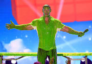 <p>The WWE star-turned-actor got slimed on stage while hosting Nickelodeon’s 2018 Kids’ Choice Awards at The Forum in Los Angeles, Calif. on Saturday night. (Photo: Kevin Winter/Getty Images) </p>