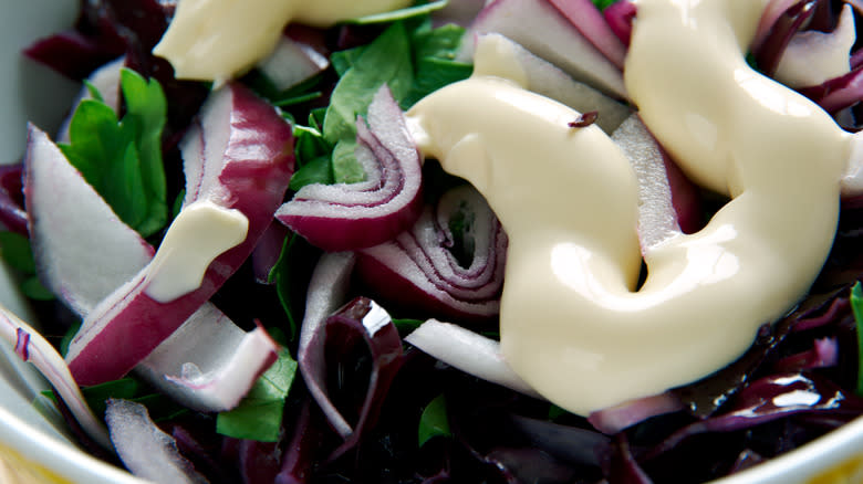 Close up of buttermilk over coleslaw 