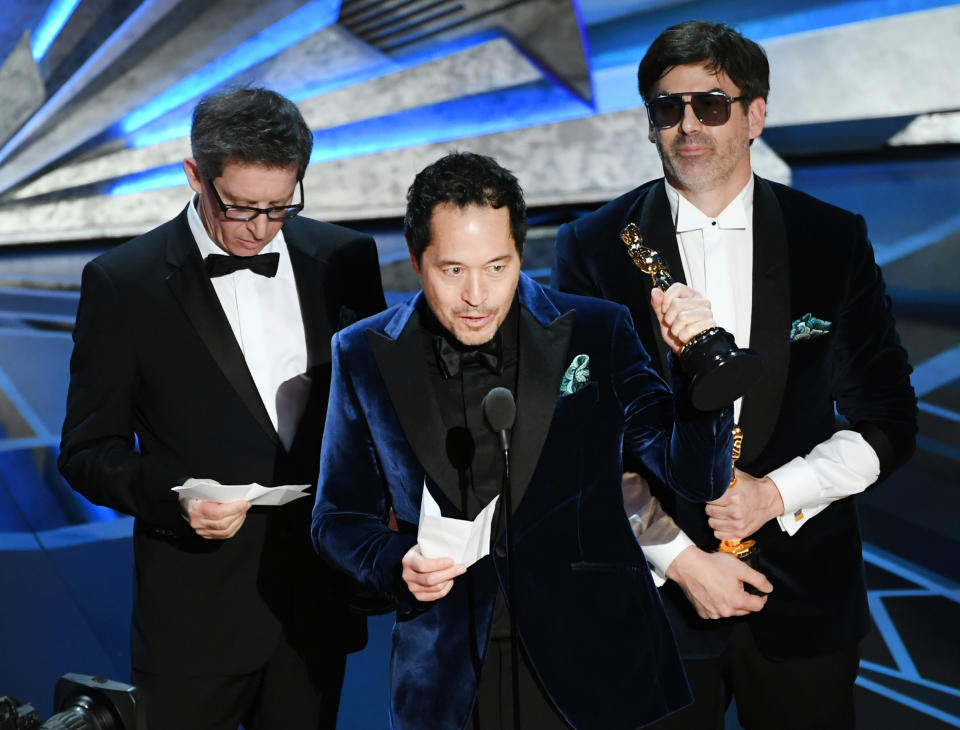 Production designers Jeff Melvin, Paul Denham Austerberry and Shane Vieau accept Best Production Design for 'The Shape of Water' onstage during the 90th Annual Academy Awards at the Dolby Theatre at Hollywood & Highland Center on March 4, 2018 in Hollywood.