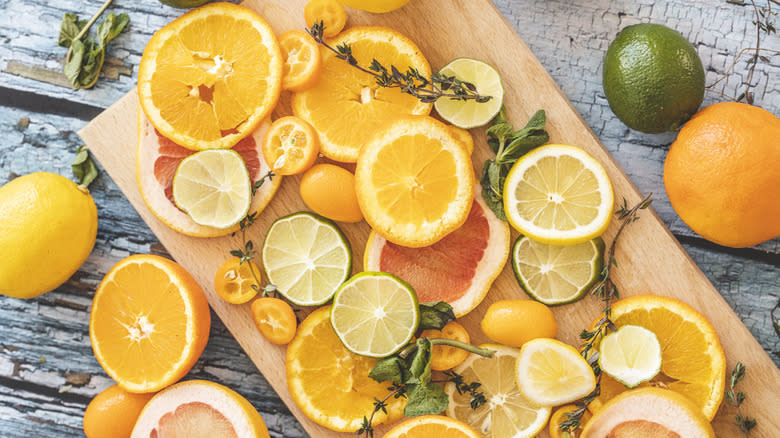 Citrus fruits on cutting board