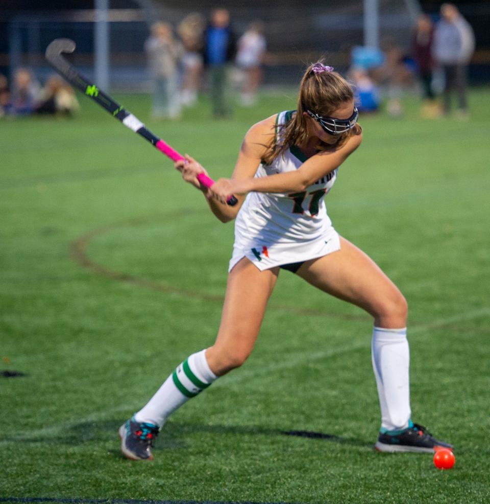 Hopkinton High School field hockey junior captain Camille Perlov winds up for a shot against Medway Oct. 12, 2022.  The game ended in a scoreless tie.