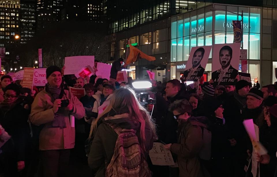 Net neutrality supporters gather at a rally in front of a Verizon store on 42nd Street in New York City on Dec. 7. (Photo: Jenna Amatulli)