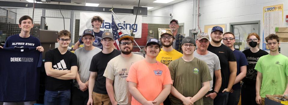 Derek Correa and his mother Alysia returned to Alfred State and met up with Derek’s classmates in the CNC Manufacturing and Machining lab.