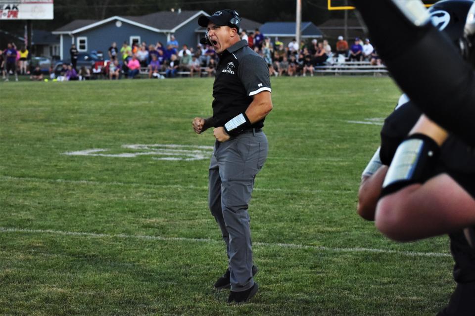 Centralia coach Tyler Forsee celebrates after the Panthers forced an interception during Centralia's 65-36 win over Hallsville at Centralia High School on Sept. 1, 2023, in Centralia, Mo.