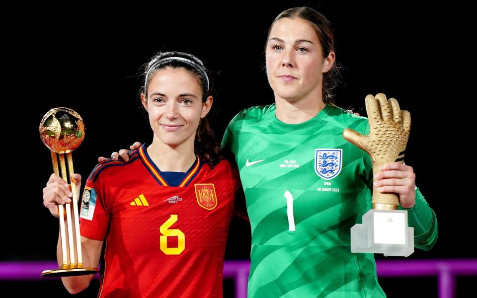 Golden Ball award winner Spain's Aitana Bonmati (left) poses for a photo with Golden Glove award winner England goalkeeper Mary Earps at the end of the FIFA Women's World Cup final match at Stadium Australia, Sydney.