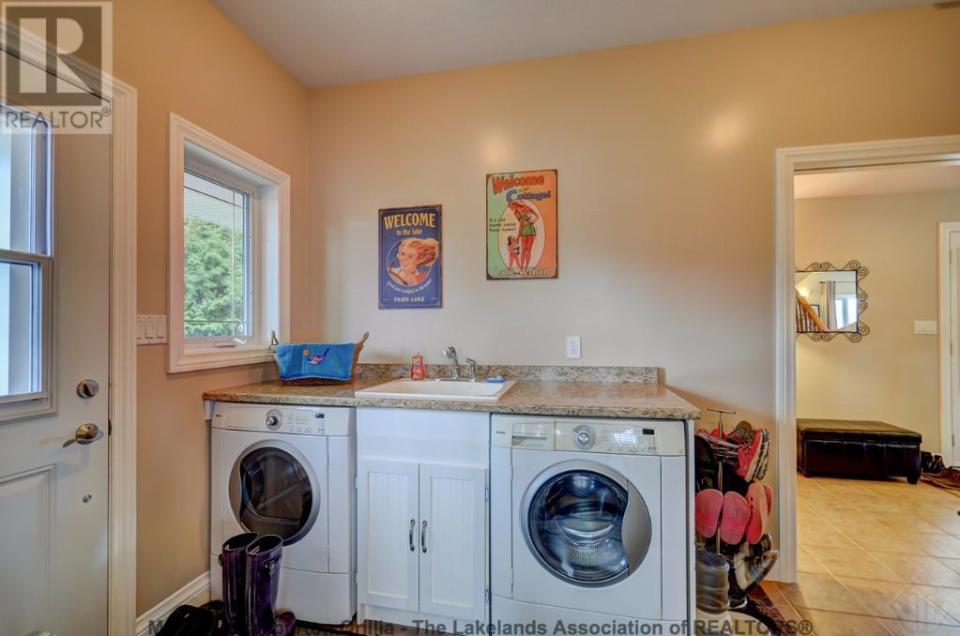 <p><span>359 Falcon Road, Huntsville, Ont.</span><br> The laundry room is conveniently on the main level, to help quickly clean up after outdoor adventures.<br> (Photo: Zoocasa) </p>