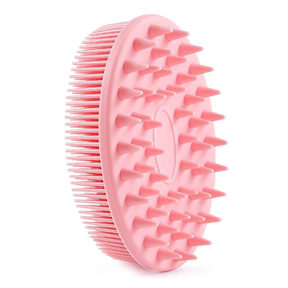 3) Silicone Exfoliating Massage Brush