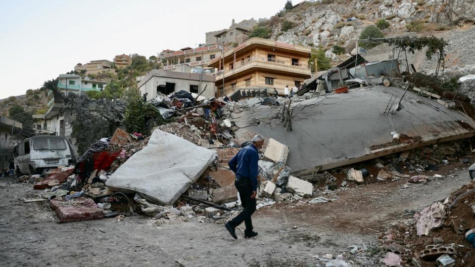 PHOTO: A man checks the destruction following an overnight Israeli airstrike in the southern Lebanese village of Shebaa near along the border between the two countries, Sept. 27, 2024.  (Rabih Daher/AFP via Getty Images)