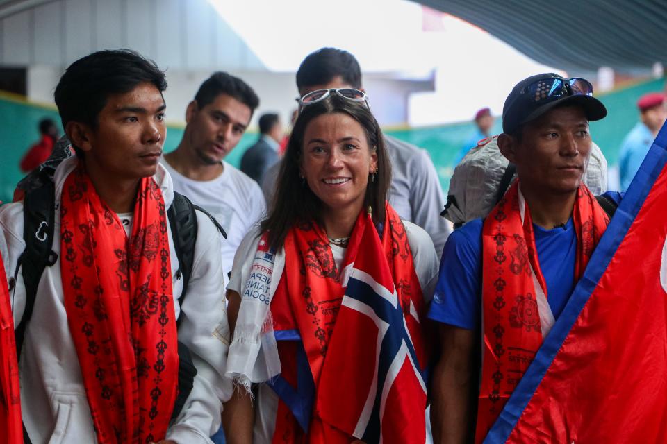 Norwegian climber Kristin Harila(C) and Tenjen Sherpa(L), set the record for the fastest summit of all 14 of the world's 8,000-meter peaks. Beside them is Nima Rinji Sherpa, who is breaking records as the youngest climber to summit the 8,000-meter mountains.