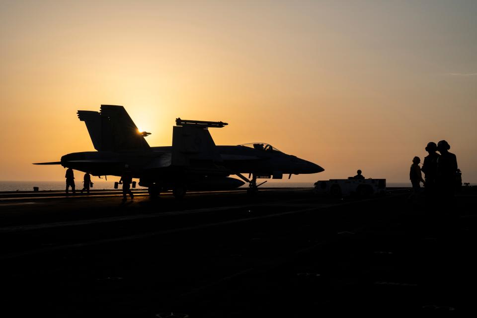 A fighter jet parks on the deck of the USS aircraft carrier Dwight D. Eisenhower in the Red Sea on June 11, 2024.