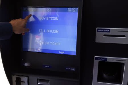 Romania's first bitcoin ATM is seen in downtown Bucharest June 27, 2014.REUTERS/Bogdan Cristel