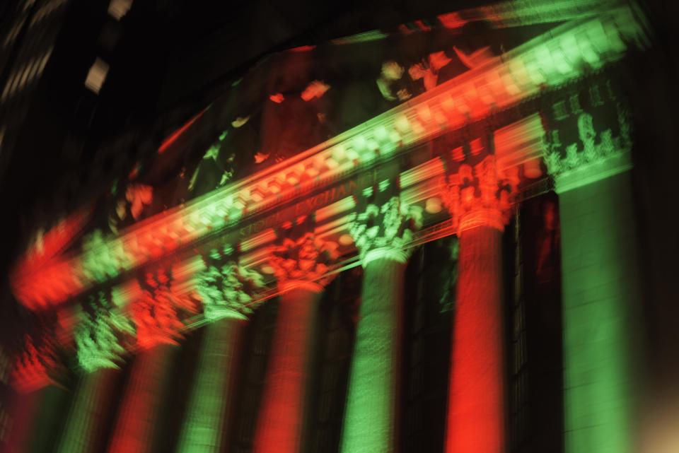 This photo made with a slow shutter speed shows the exterior of the New York Stock Exchange on Thursday evening, Dec. 20, 2018. Stocks went into another slide Thursday in what is shaping up as the worst December on Wall Street since the depths of the Great Depression, with prices dragged down by rising fears of a recession somewhere on the horizon. The Dow Jones Industrial Average dropped 464 points, bringing its losses to more than 1,700 since last Friday. (AP Photo/Patrick Sison)