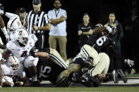 Vanderbilt running back Re'Mahn Davis (6) spins around as he runs for a touchdown against Stanford in the first half of an NCAA college football game Saturday, Sept. 18, 2021, in Nashville, Tenn. (AP Photo/Mark Zaleski)