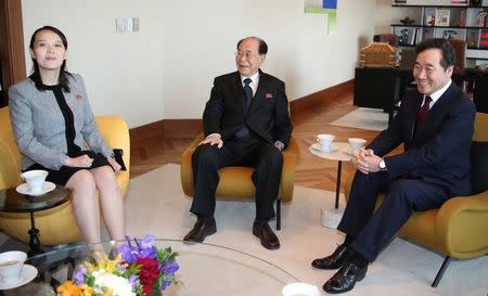 President of the Presidium of the Supreme People's Assembly of North Korea Kim Young Nam and Kim Yo Jong, the sister of North Korea's leader Kim Jong Un, are greeted by South Korea's Prime Minister Lee Nak-yeon as they smile before a banquet in Seoul, South Korea February 11, 2018. Yonhap via REUTERS