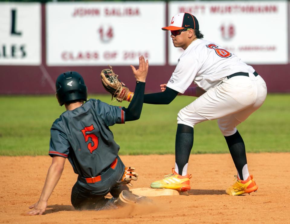 Lakeland's Chris Conde forces out Lake Wales' Diego Colon at second base on Wednesday in the third-place game of the Dan Giannini Baseball Classic.