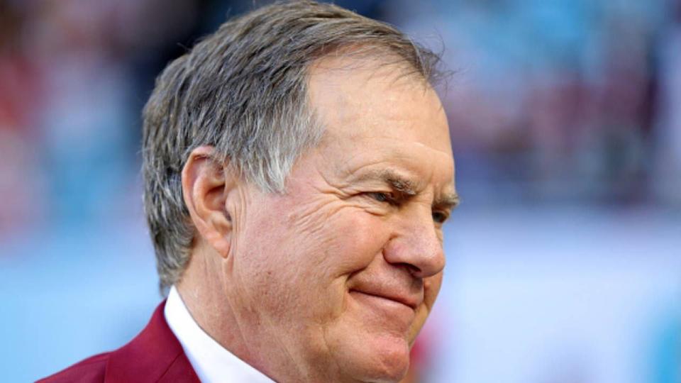 An unusual sight: New England Patriots coach Bill Belichick is a spectator at a Super Bowl.